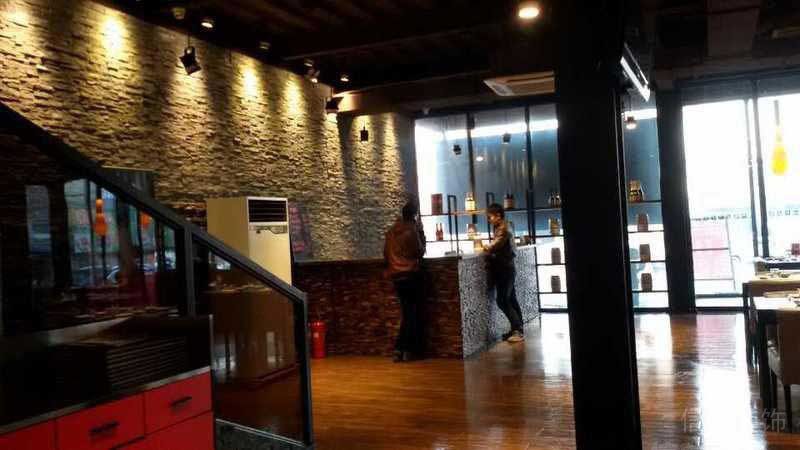 办公室工业风文化石前台效果图