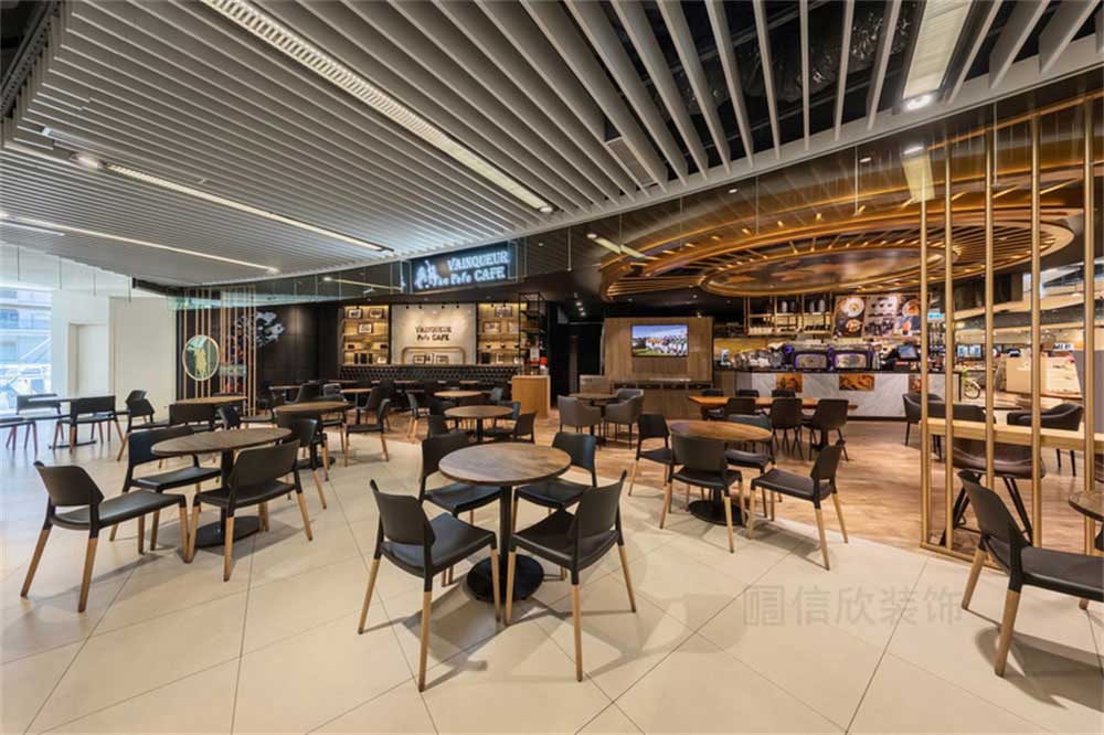 深圳宝安工业风咖啡厅装修设计工程钛金色不锈钢圆柱装饰格栅