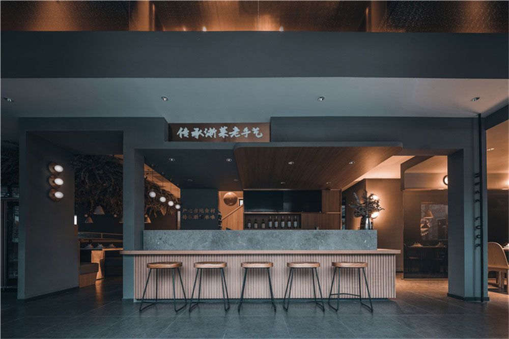 简约风浙江特色菜连锁餐厅深圳龙华店装修设计吧台用餐区