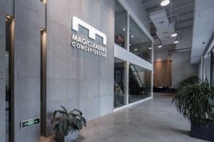 现代灰色办公室装修效果图白色字体字母形象设计过道工业风