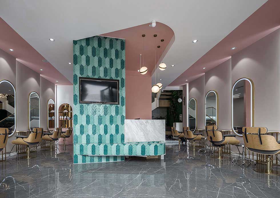 粉色的美发店发廊大厅装修设计