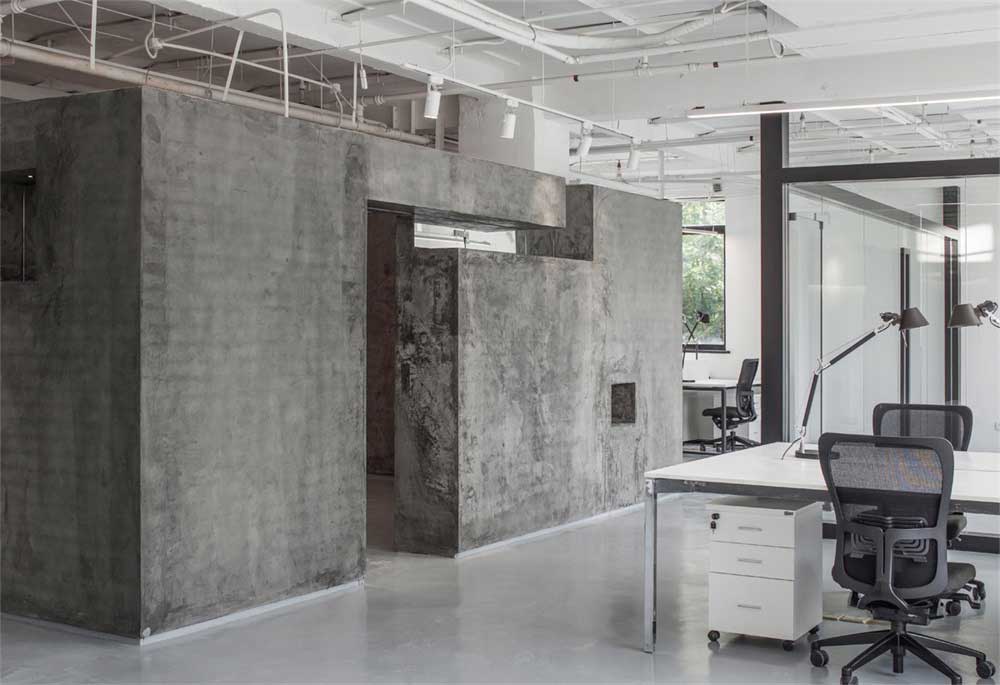 深圳龙岗300平方极简风格办公室装修清水混凝土造型背景墙