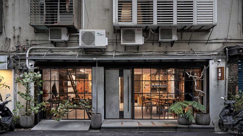 复古街边店铺装修工作室城市艺术创意产业园玻璃隔断格子金属黑色边框效果图