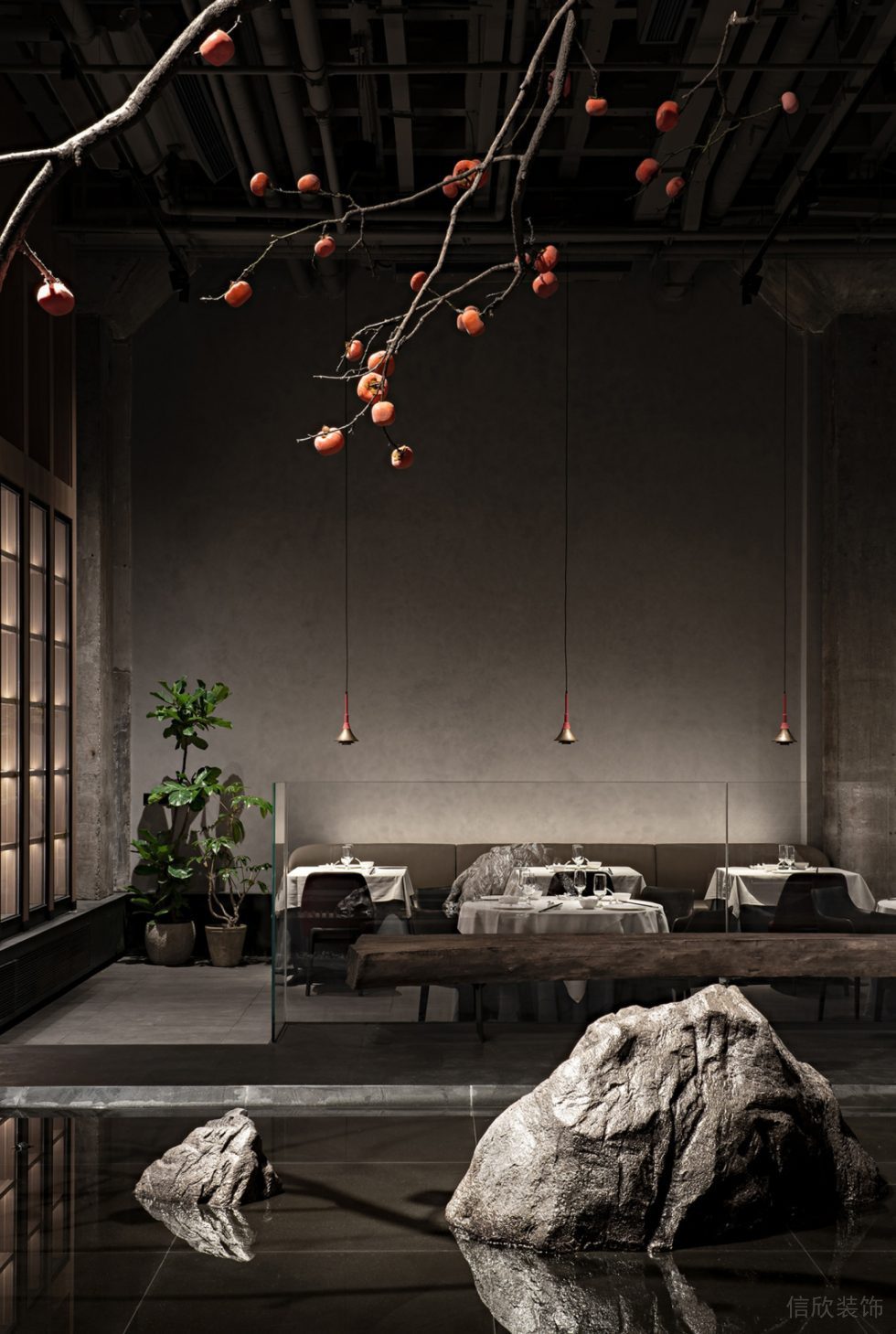 深圳福田新中式文化砖餐厅室内石头造景装修设计
