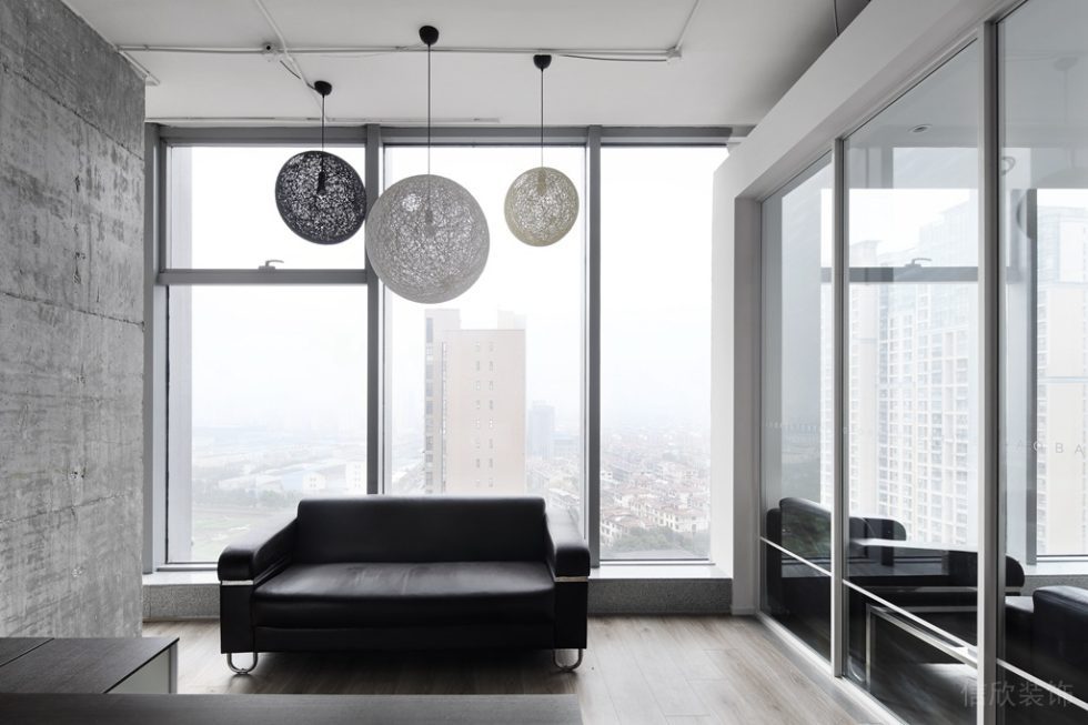深圳龙华卫东龙商务大厦300平方米简约素色风格办公室装修案例休息区浅色调水泥墙面