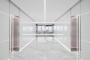 洁白现代风办公室装修设计白色电梯厅效果图