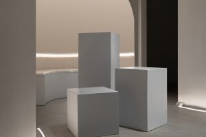 白色极简艺术雕塑品展厅装修案例 白色软包坐垫休息区