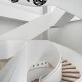 多功能复合空间展厅装修设计 白色调螺旋楼梯