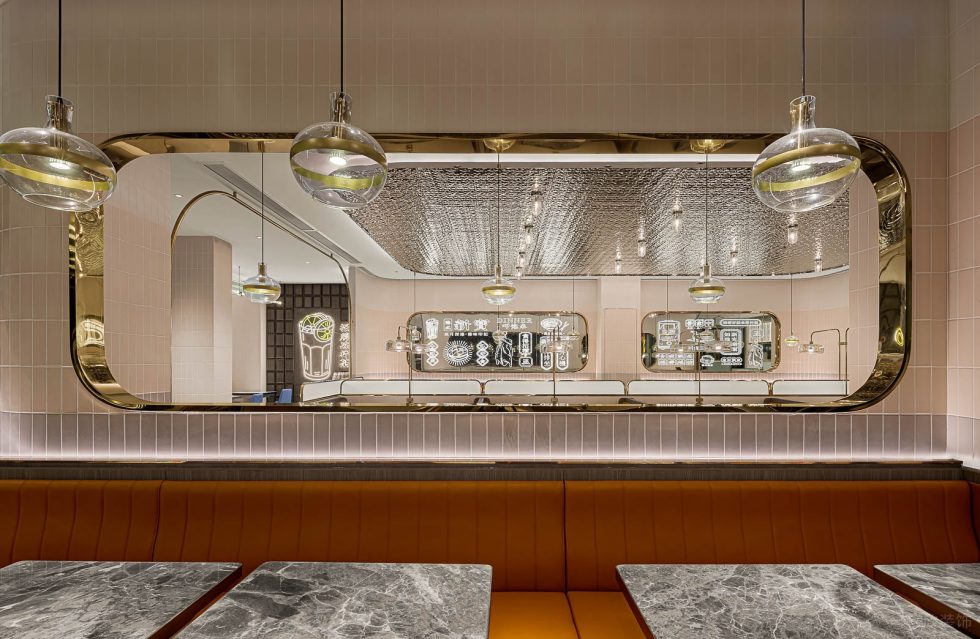 新潮轻奢港式餐厅圆矩形镂空背景墙设计效果