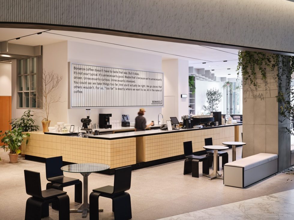 现代简约风咖啡厅黑色线条点缀米黄操作台设计图
