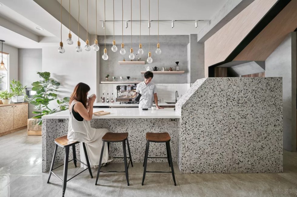 现代简约风咖啡厅水磨石台体配高光白台面操作台设计展示图